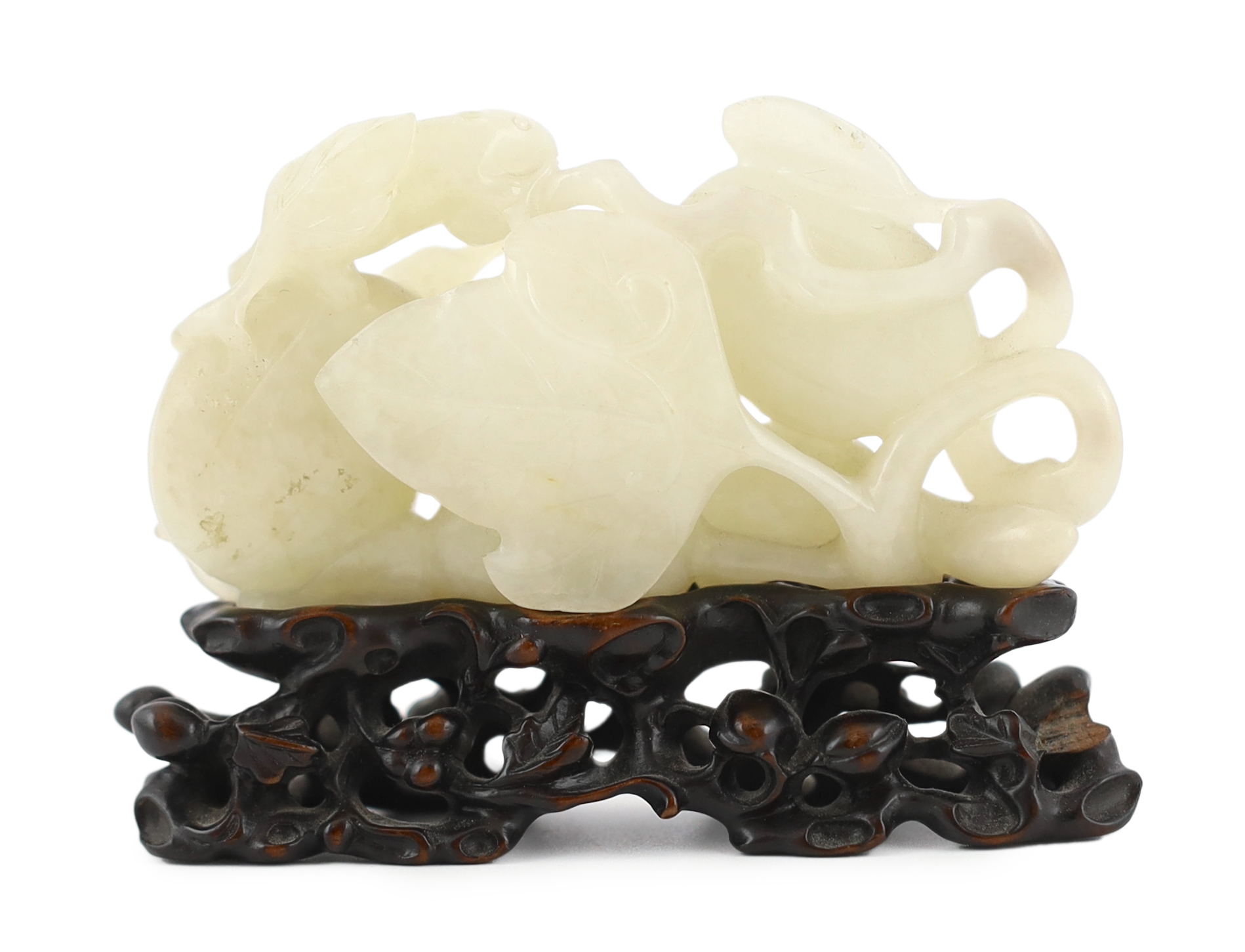 A Chinese white jade carving of a cluster of melons, 18th century